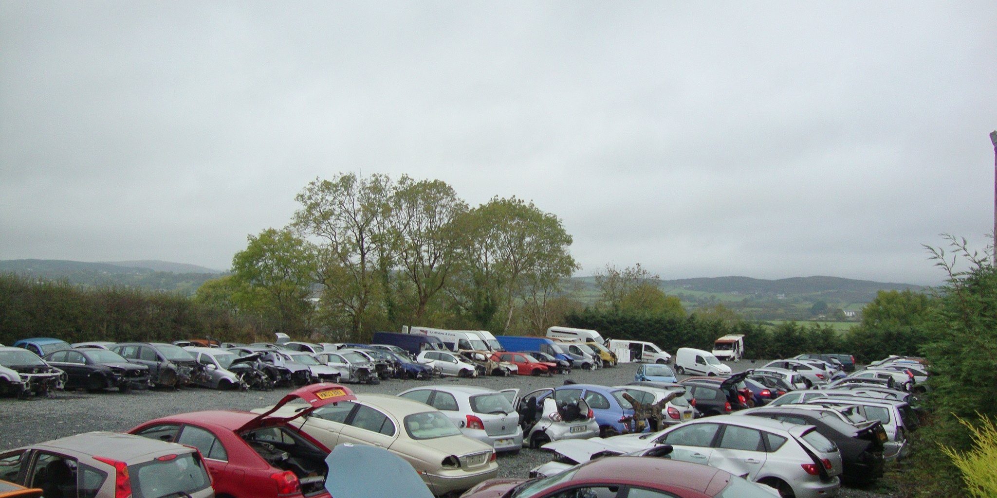 yard with various vehicles